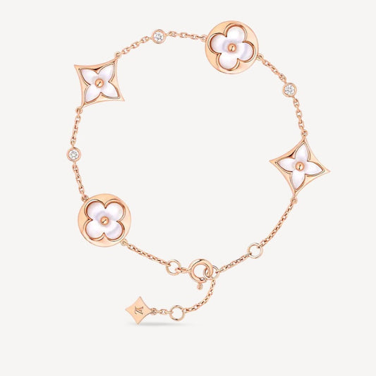 [Regalia jewelry]STAR AND SUN 4 MOTIF WHITE MOP PINK GOLD BRACELET
